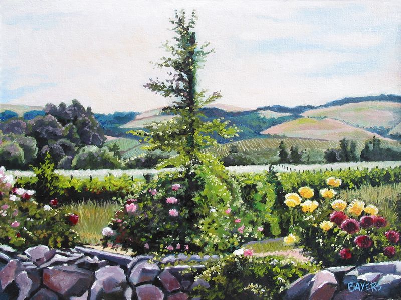 rock fence with roses and tree